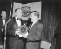 Walter Reuther receiving Man of the Year Award from the West Virginia Society of The Distric of Comulbia. no date.