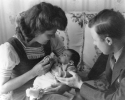 An early photo of baby Linda with new parents Walter and May Reuther.