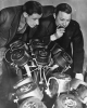 Victor (left) and Walter Reuther broadcasting a union message from an airplane.  late 1930&squo;s