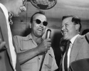 Upon his arrival at Tulln airbase, Mr. Reuther was interviewed by radio reporter Victor Fit (center) on behalf of the Red-White Red Network."July 30, 1953