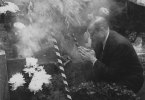 Walter Reuther is shown honoring the memory of the founder of trade unionism in Japan.  A UAW delegation places a wreath and burns incense at his grave."November 18, 1962