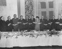 Walter Reuther at the American Council on Productivity, which to place in Detroit on April 4, 1949.

UAW Secretary-Treasurer Emil Mazel and May Reuther are sixth and seventh from the left. 