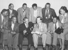 Walter Reuther carrying on a onversation with a group of delegates at the 9th CIO Constitutional Convention in Boston. October 13-17, 1947