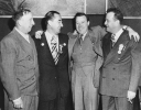 Celebrating reelection victory after a lanslide victory at the UAW-CIO Convention in Atlantic City N.J.  November 12, 1947

Left to right;  Richard T. Gosser, Emil Mazey, Walter Reuther and Jack Livingston.