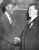 Walter Reuther shaking hands with a delegate at the 10th UAW Constitutional Convention in Atlantic City N.J. "ca. 1946"