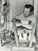 Walter Reuther at work in his basement workshop.