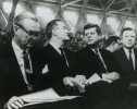 Left to Right:  Stuart Semington (sp.), Hubert Humphrey, President John F. Kennedy and Walter P. Reuther."