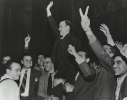 Walter Reuther raised up on shoulders after his UAW presidential victory