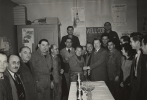 During his visit in Paris following the London Labor Conference, Walter Reuther, President of the United Automobile Workers, CIO, visited the Renault Automobile Plant on December 12, 1949.  Following this, he presented gift packages to the Force Ouviere trade union section on behalf of the American workers.  Mr. Reuther is in the center bbackground of the photograph, seen shaking hands with a F.O. worker at the Renault plant."December 12, 1949