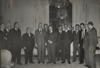 Ambassador David Bruce recieved at a luncheon in Paris, December 10, 1949, the American trade unionist who participated at the London Labor Conference.  From Left to Right:  Messrs. Barry Bingham, Cheif of the ECA Special Mission to France; Charles J. MacGowan, President of the International Brotherhood of Boilermakers, Iron Ship Builders and Helpers of America, AFL; Ambassador Averell Harriman, Special Represenative of the ECA; Matthew Woll, Vice President of tthe AFL, and President of the International Photo-Engravers&squo; union, AFL, and Chairman of the AFL Committee of International Relations; Favid Bruce, U.S. Ambassador to France; Kenneth Douty, Cheif of the Labor Division, ECA Special Mission to France; Walter Reuther, President of the United Automobile Workers, CIO; Richard Kelly, Labor Information Officer of ECA French Mission; Ambassador Milton Katz, Deputy to Ambassador Harriman; Jame Stern, Production SPecialist for ECA-OSR; Guy Nunn, Assitant to Walter Reuther; Jay Lovestone, Secretary of the AFL Free Trade Union Committee; Boris Shishkin, Labor Advisor to Mr. Harriman.