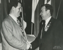 Walter Reuther shaking hands with Al Frankensteen."September, 1944""