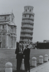 Walter Reuther posing for a photo outside of the Leaning Tower of Pisa while visiting Italy.