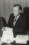 Walter Reuther taking notes at a meeting with Turkish labor leaders.